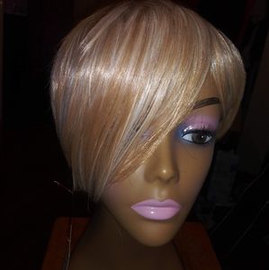 Short blond wig over eye